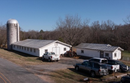 Workshop, silo, and retail kitchen with parking.