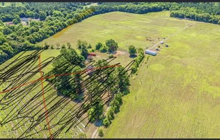 Open cleared flat land not marked off