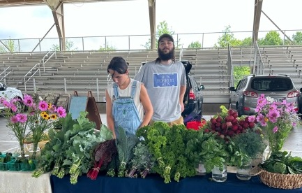 Me and Lilly selling at local farmers market 