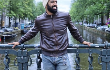 Me in front of a canal in Amsterdam