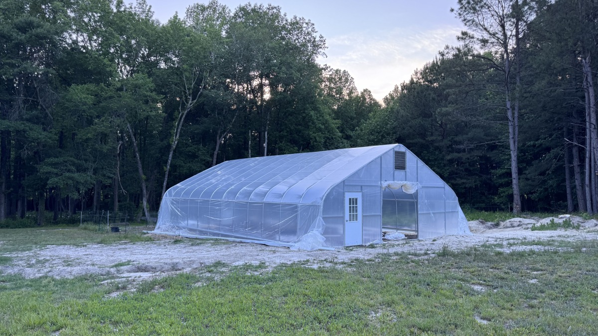 High tunnel. Water and power existing 