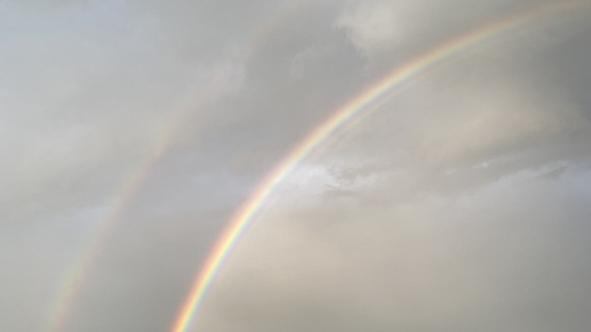 A double rainbow gives hope over the homestead after days of rain