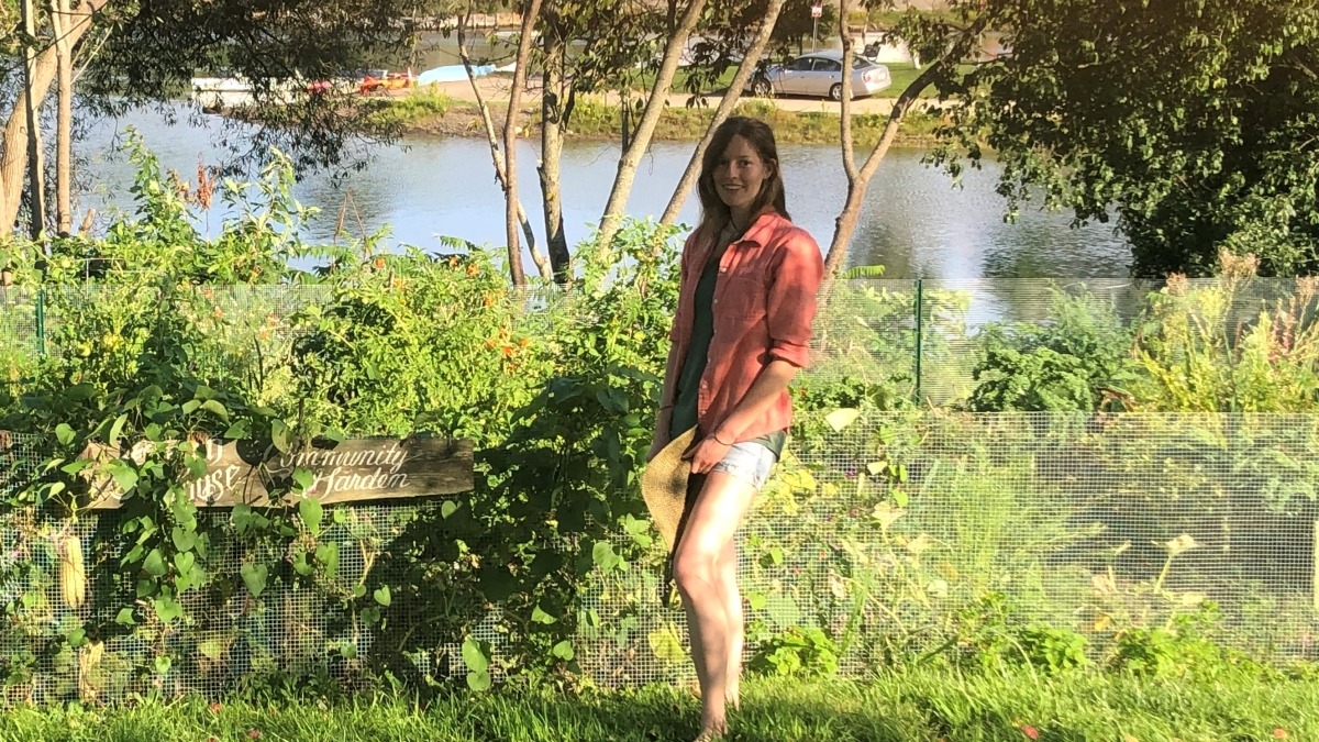 Me in front of one of my community gardens