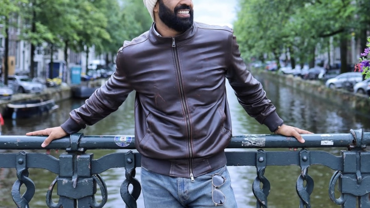 Me in front of a canal in Amsterdam