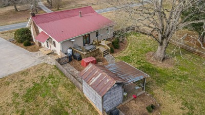 Rear of property with additional buildings