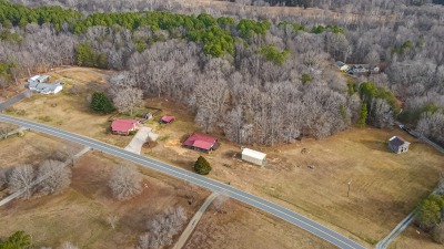 view which includes back area of property as well as side