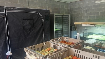 Seeding & microgreen room with germination chamber.