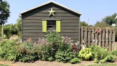 Garden shed & storage yard with flowers