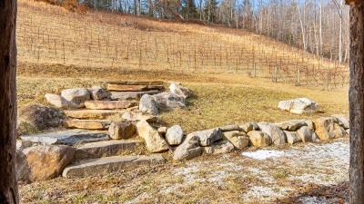 Cleared area ready for a pavilion to be built in between the barn and vineyard