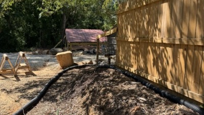 view looking down towards water shelter and chicken area