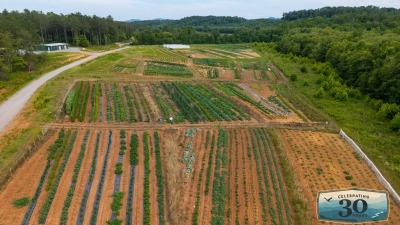 Overview of farm field and storage building