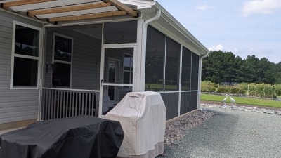 Owner home shade pergola and double size screen porch