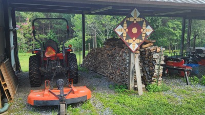 Tractor and implement shed