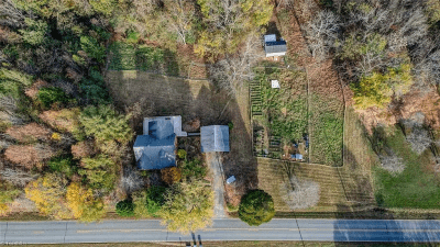 Overhead view of house & cleared areas