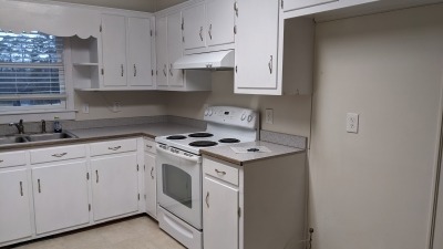 Kitchen... Shows space for a refridgerator