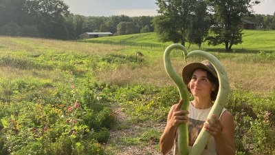 Lilly with some huge cucuzza gourds!