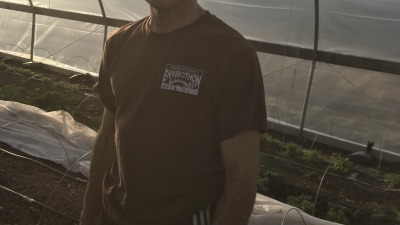 In one of the high tunnels at Famr of Peace, spring 2019