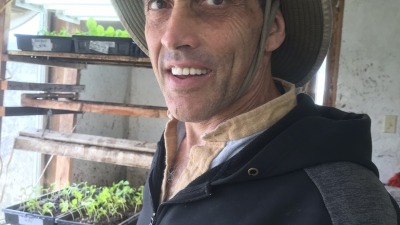 In seed shed at Farm of Peace, April 2019