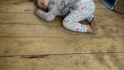 Toddler alto on a porch