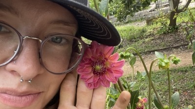 Emma with a flower