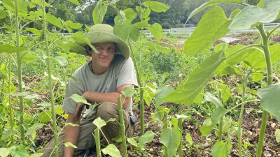 Aaron in a bed of sunflowers