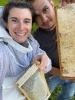 My wife, Lauren, and I caring for our bees