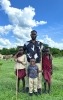 My son and I with some Masai kids in our farm in Tanzania