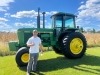 Me standing by my new John Deere 4640 ready to put it to work!