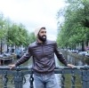 Picture of me in front of the canals in Amsterdam
